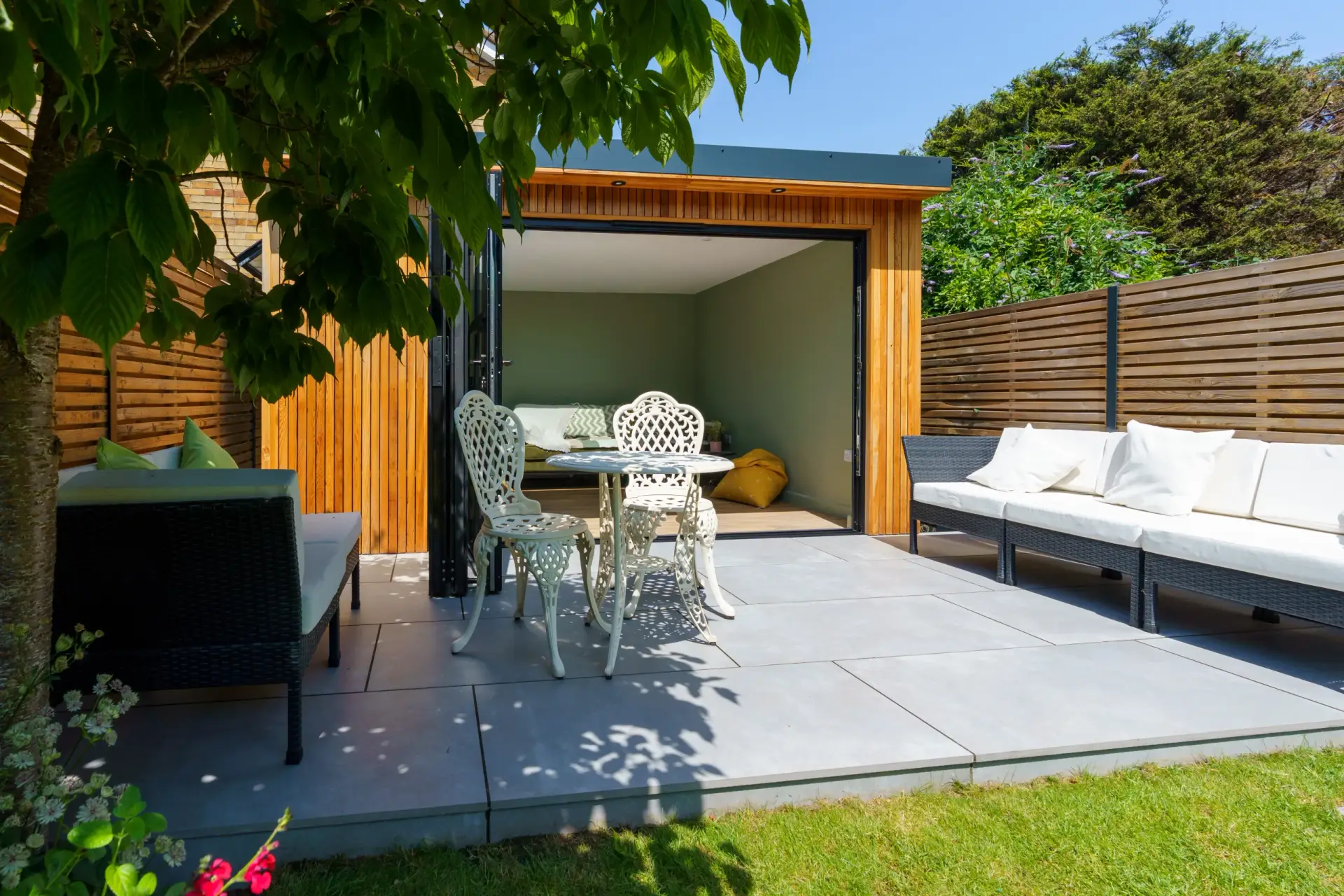 An aluminium framed garden room in a London garden